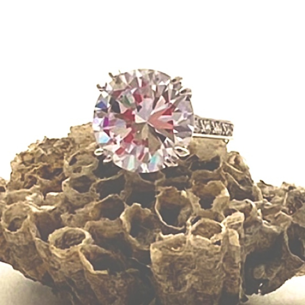 Silver plated and cubic zirconia ring. Size 6.5.